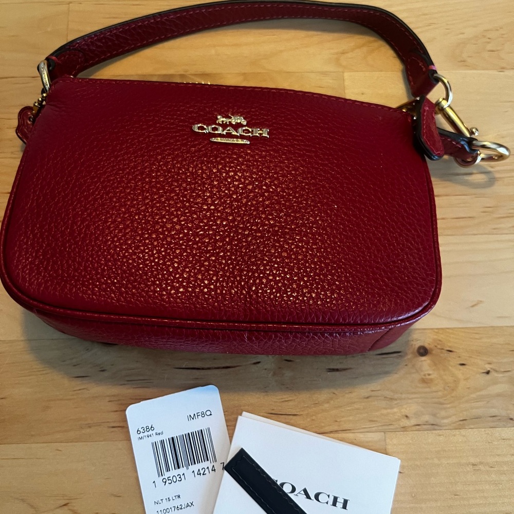 Mini red coach bag- new never used with tags.